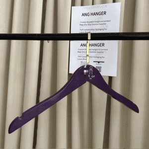 Wood shirt hangers wholesale (front view) | Purple wooden hangers with custom logo