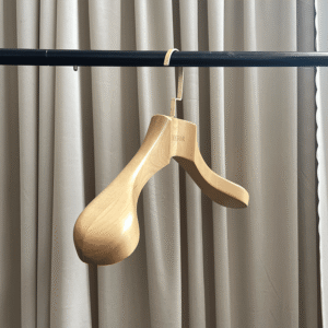 Natural wood jacket coat hangers with curved groove design