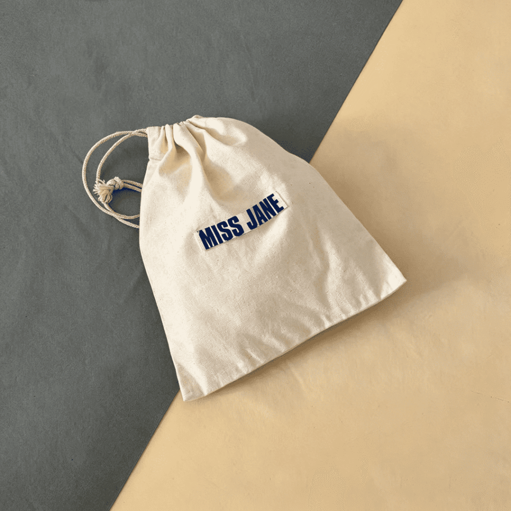 Custom Beige Cotton Linen Drawstring Dust Bag with Blue Embroidery Logo | Eco-Friendly Protective Storage Bag