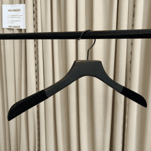 Wood velvet hangers (front view) | Matte black hanger with non-slip velvet shoulders