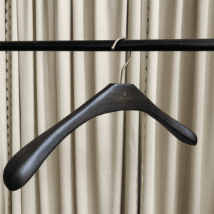 Wooden jacket hangers (side view) | 44cm wide shoulder dark wood hanger