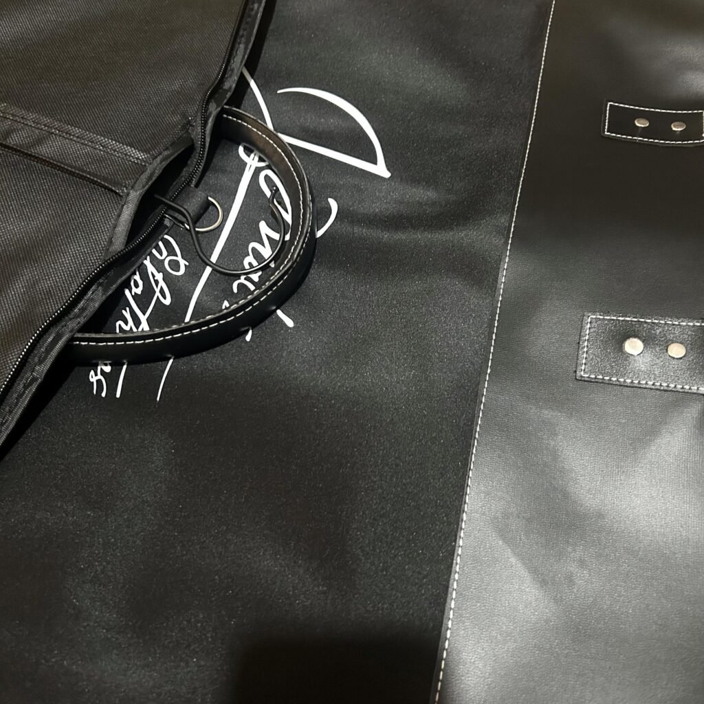 Premium customized leather garment bag with printed logo, leather handle and rivet details