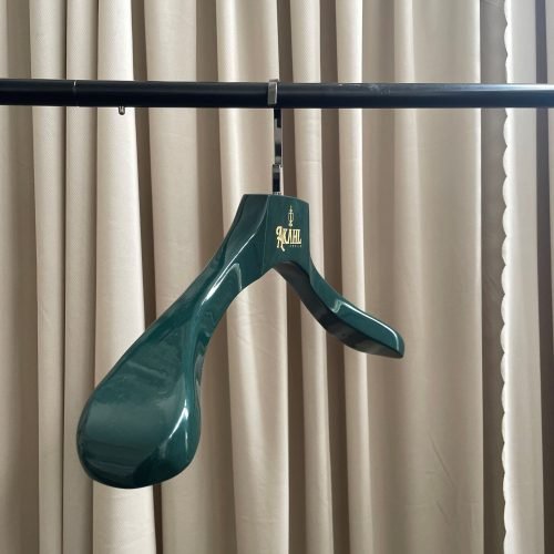 Dark green glossy custom wooden suit hanger with gold branded logo for clothing brands and retail