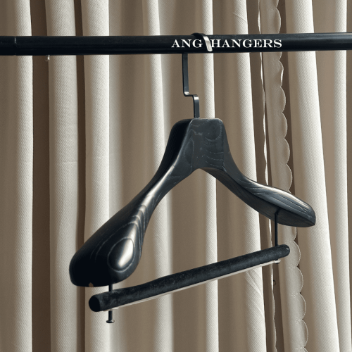 Matte black hangers with exposed natural wood grain texture, wide shoulder construction and non-slip velvet trouser bar, premium solid wood black suit hangers with flat metal hook for apparel boutique display