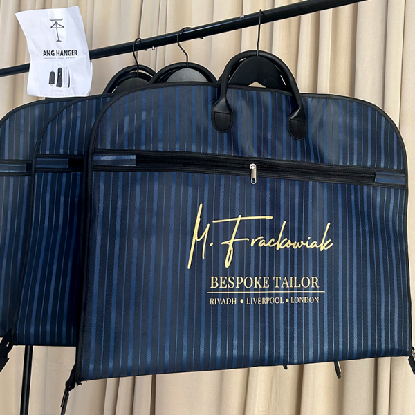 Navy striped custom logo suit cover with gold branding for bespoke tailors and apparel brands