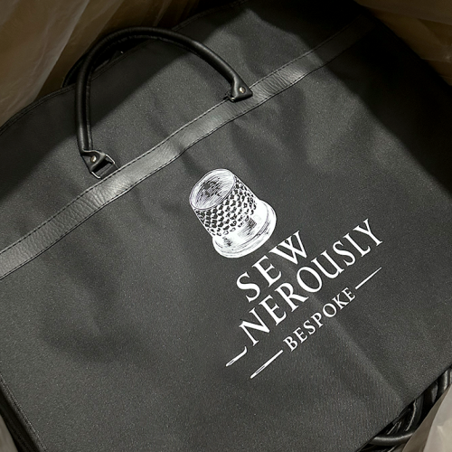 Custom logo travel clothes bag with printed brand design for clothing retail brands