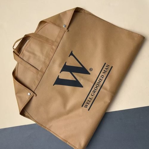 Beige custom logo travel clothes bag with printed brand design for clothing retail brands