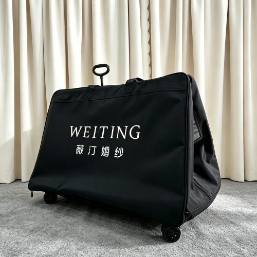Black rolling custom wedding dress bag with telescopic handle and wheels, wholesale bridal gown travel bag for bridal boutiques